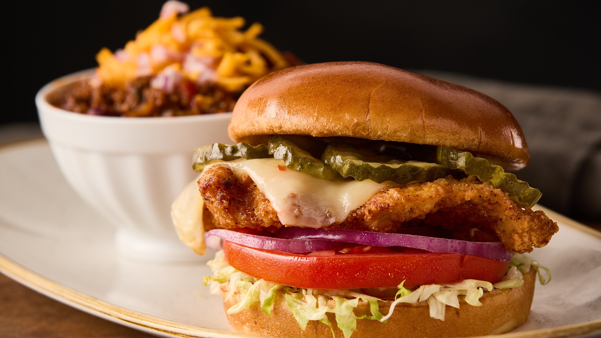 Crispy Chicken Sandwich and bowl of Chili