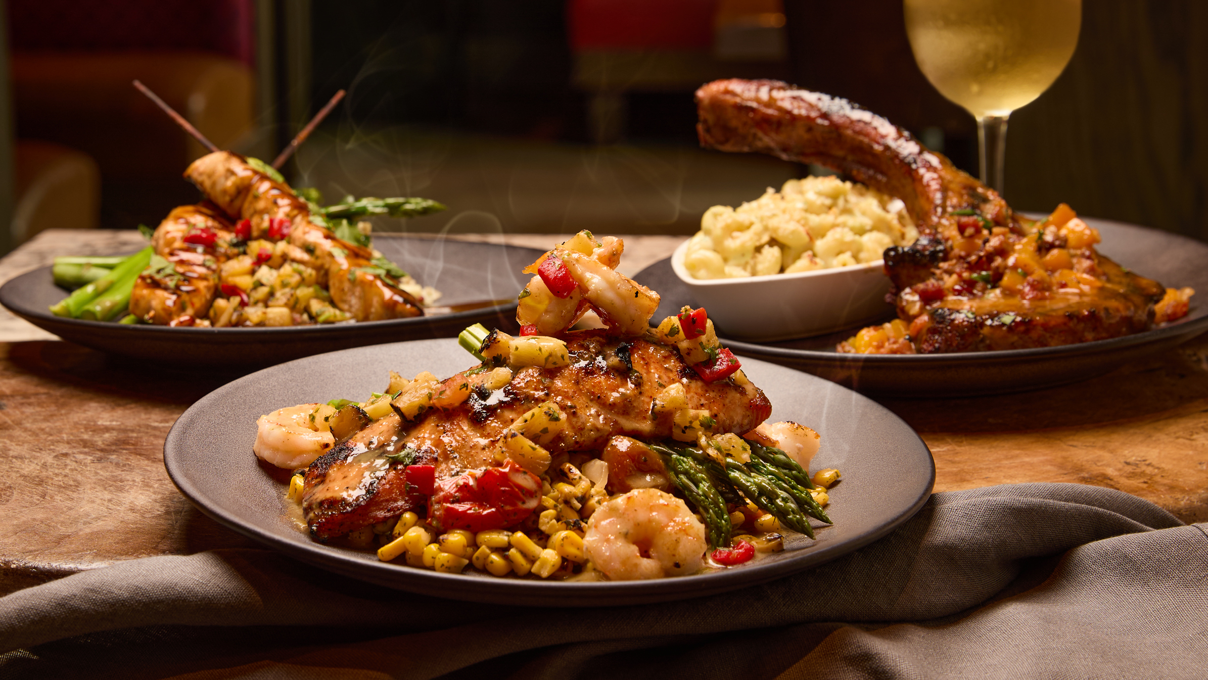 Salmon and shrimp, pork and grilled chicken kabobs